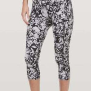 Lululemon Athletica Black floral fast and free 19” nulux with side pockets